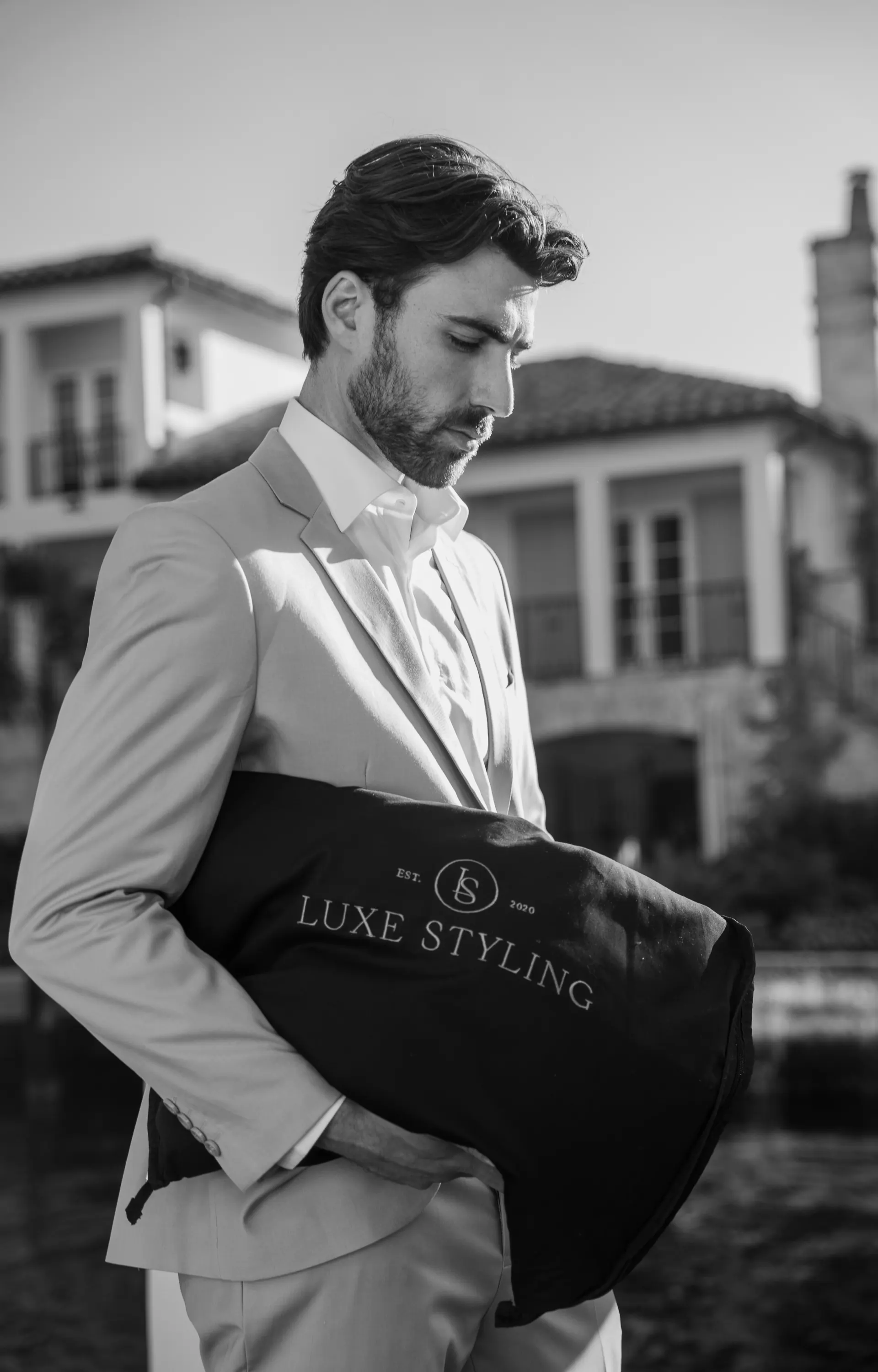 Garment bag, delivered by hand